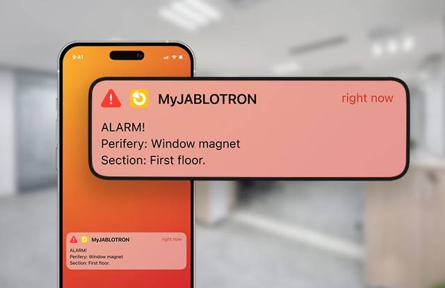 MyJABLOTRON alarm notification on a smartphone